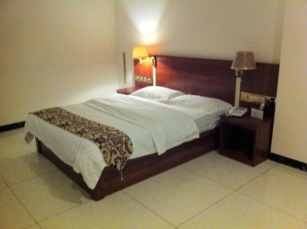 زاوشينغ Guoxing Business Hotel المظهر الخارجي الصورة