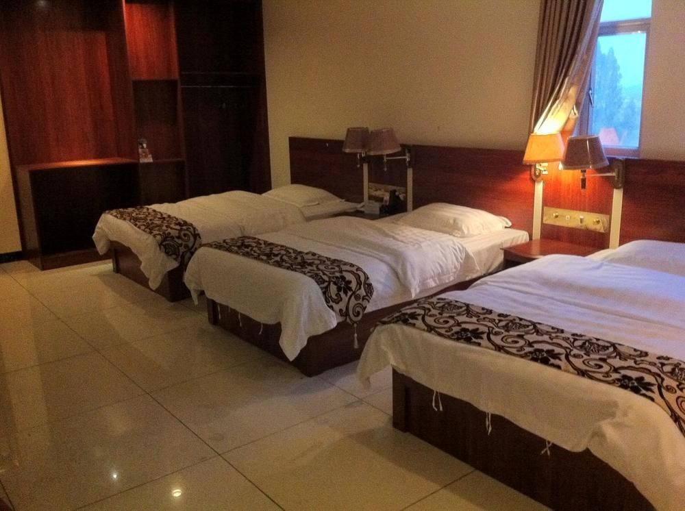 زاوشينغ Guoxing Business Hotel المظهر الخارجي الصورة