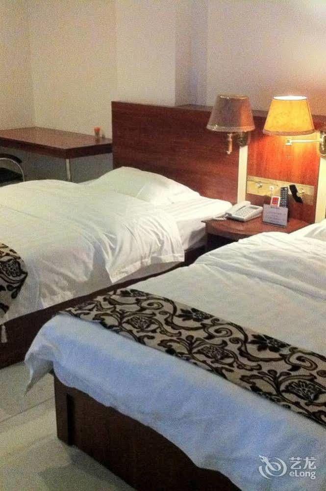 زاوشينغ Guoxing Business Hotel المظهر الخارجي الصورة