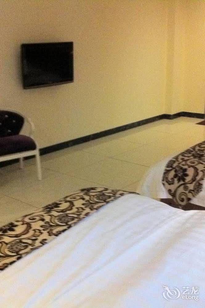 زاوشينغ Guoxing Business Hotel المظهر الخارجي الصورة