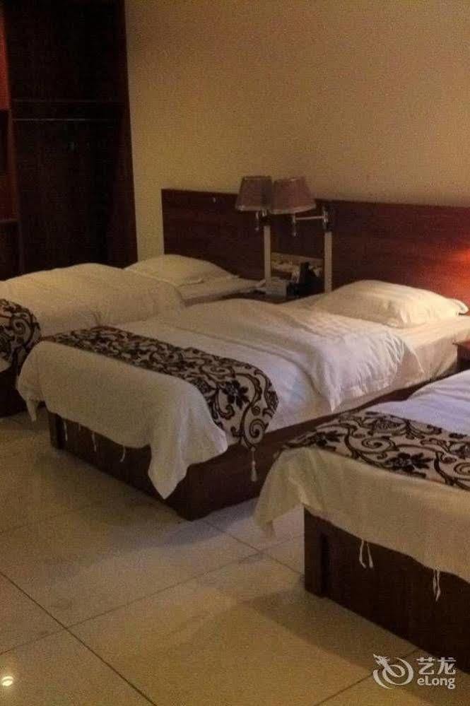 زاوشينغ Guoxing Business Hotel المظهر الخارجي الصورة